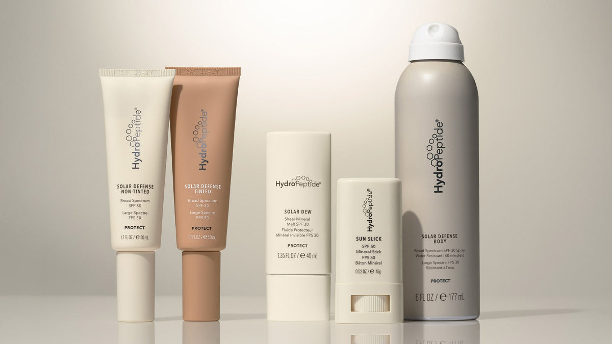HydroPeptide Protect and SPF collection of products against a light gold background