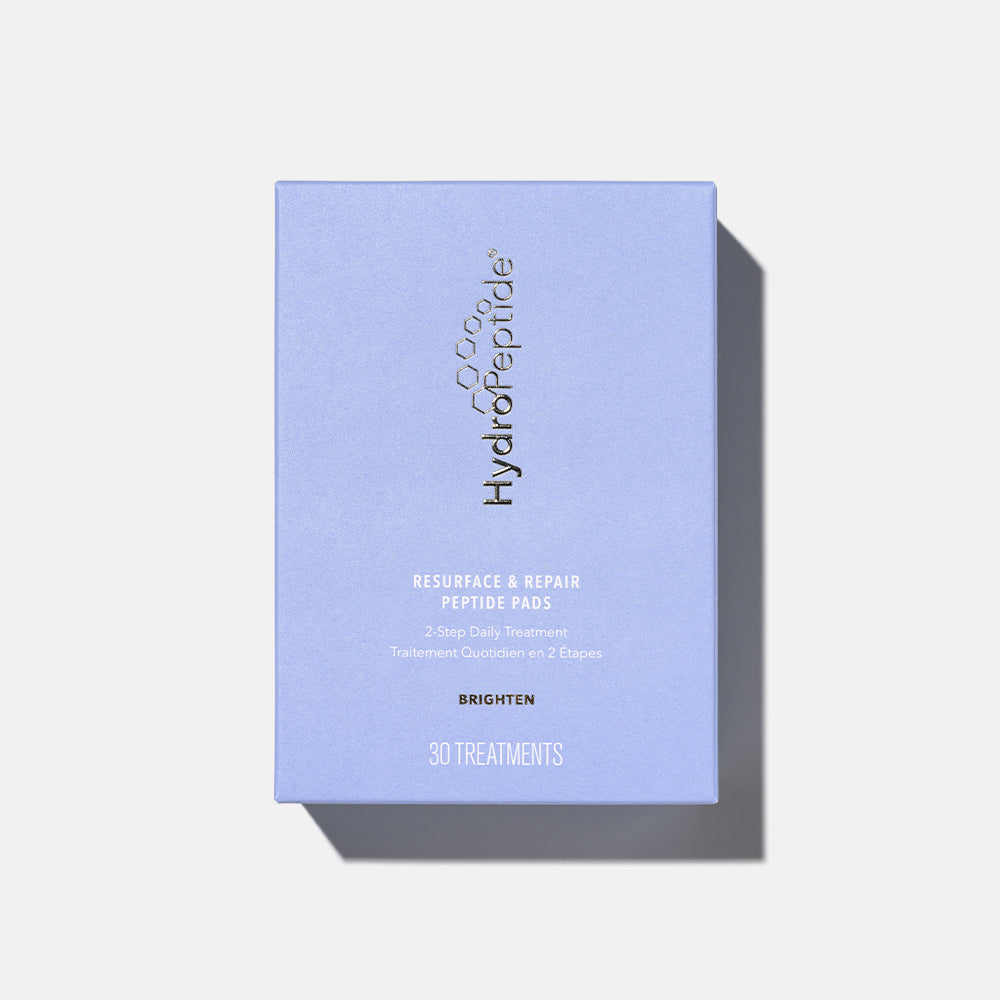 Light purple box of HydroPeptide Resurface and Repair Peptide Pads on a light gray background