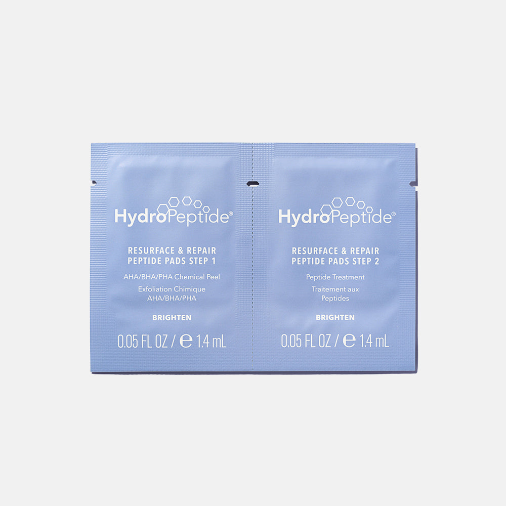HydroPeptide Resurface and Repair Peptide Pads sachets on a light gray background
