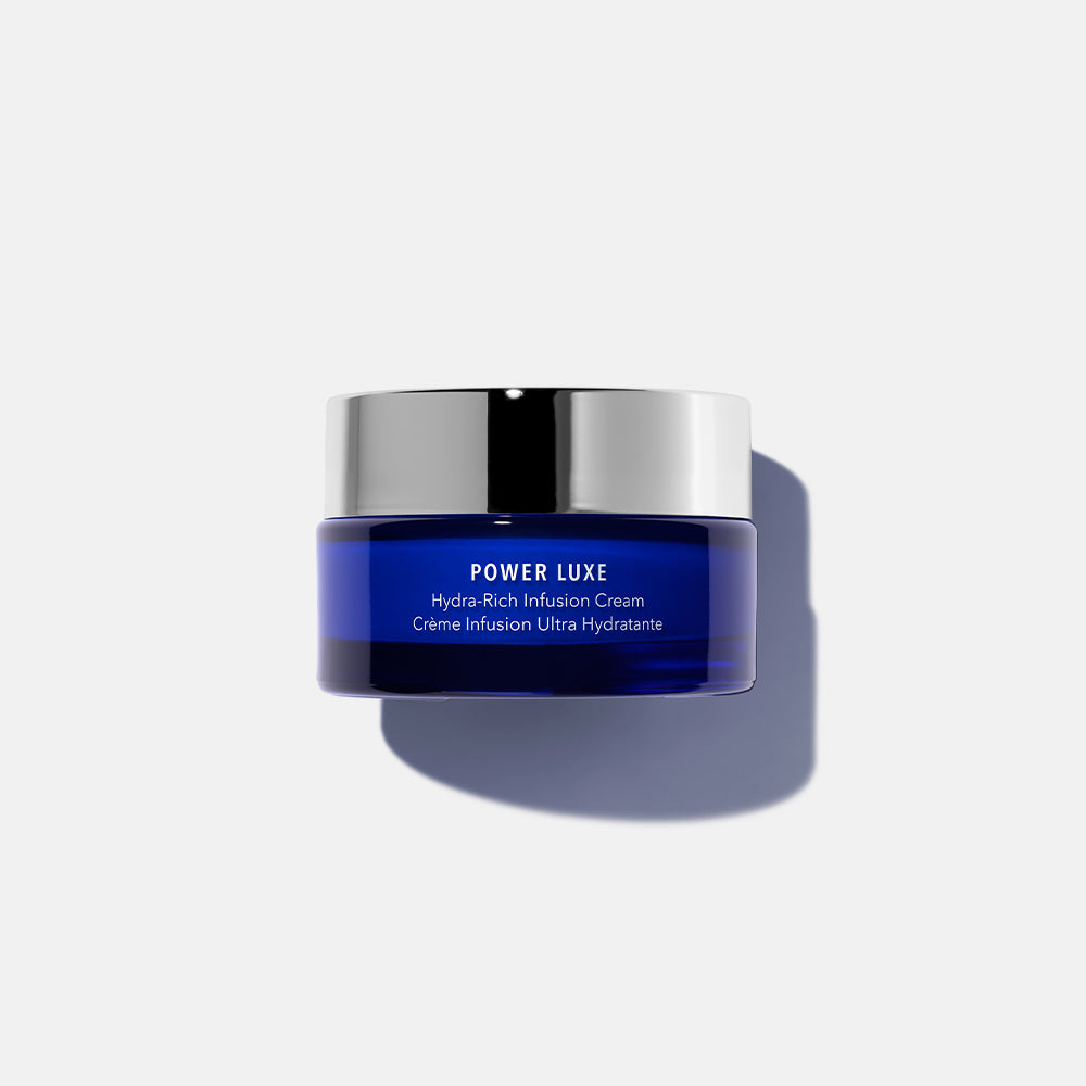 HydroPeptide Power Luxe Moisturizer in blue jar with silver lid on light grey background