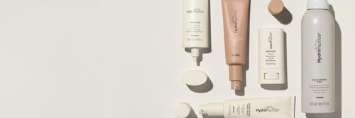 HydroPeptide Solar Defense Products against a light cream background